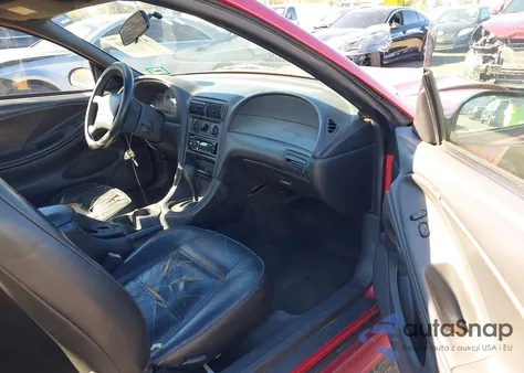 1999 Ford Mustang z USA, uszkodzony, nr VIN 1FAFP4041XF215271